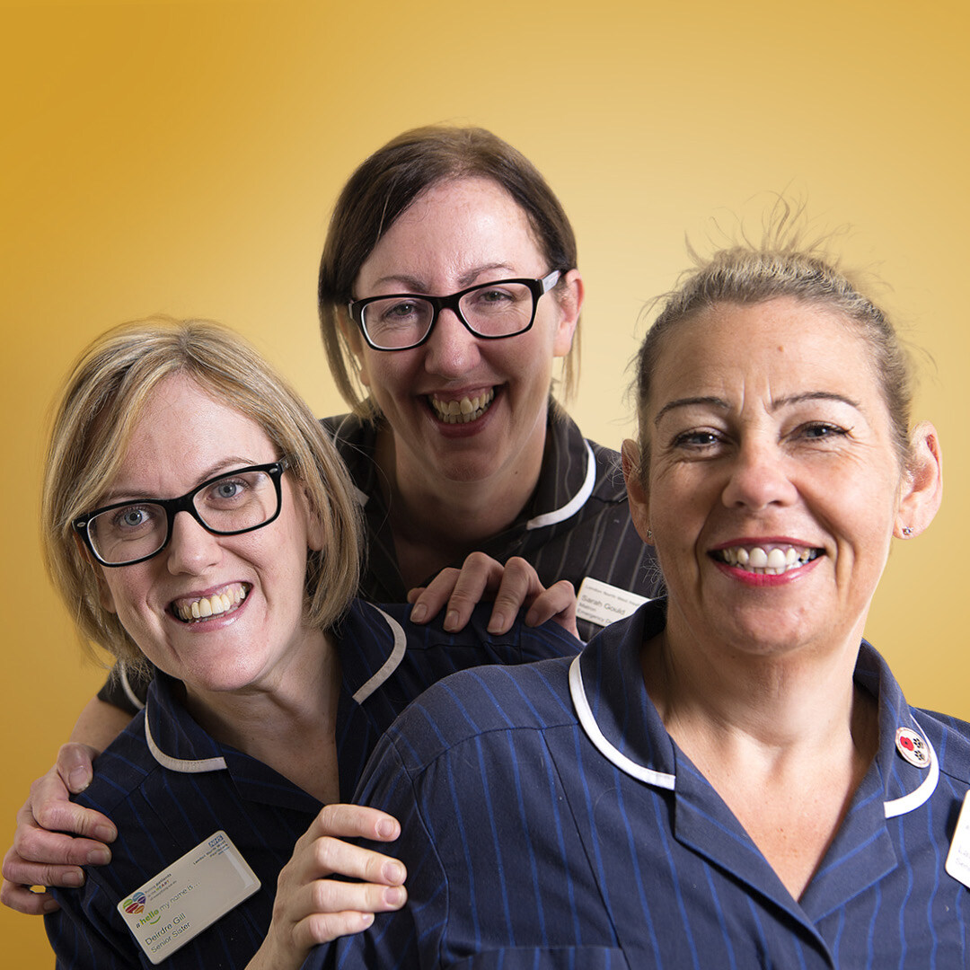 Three employees portrait